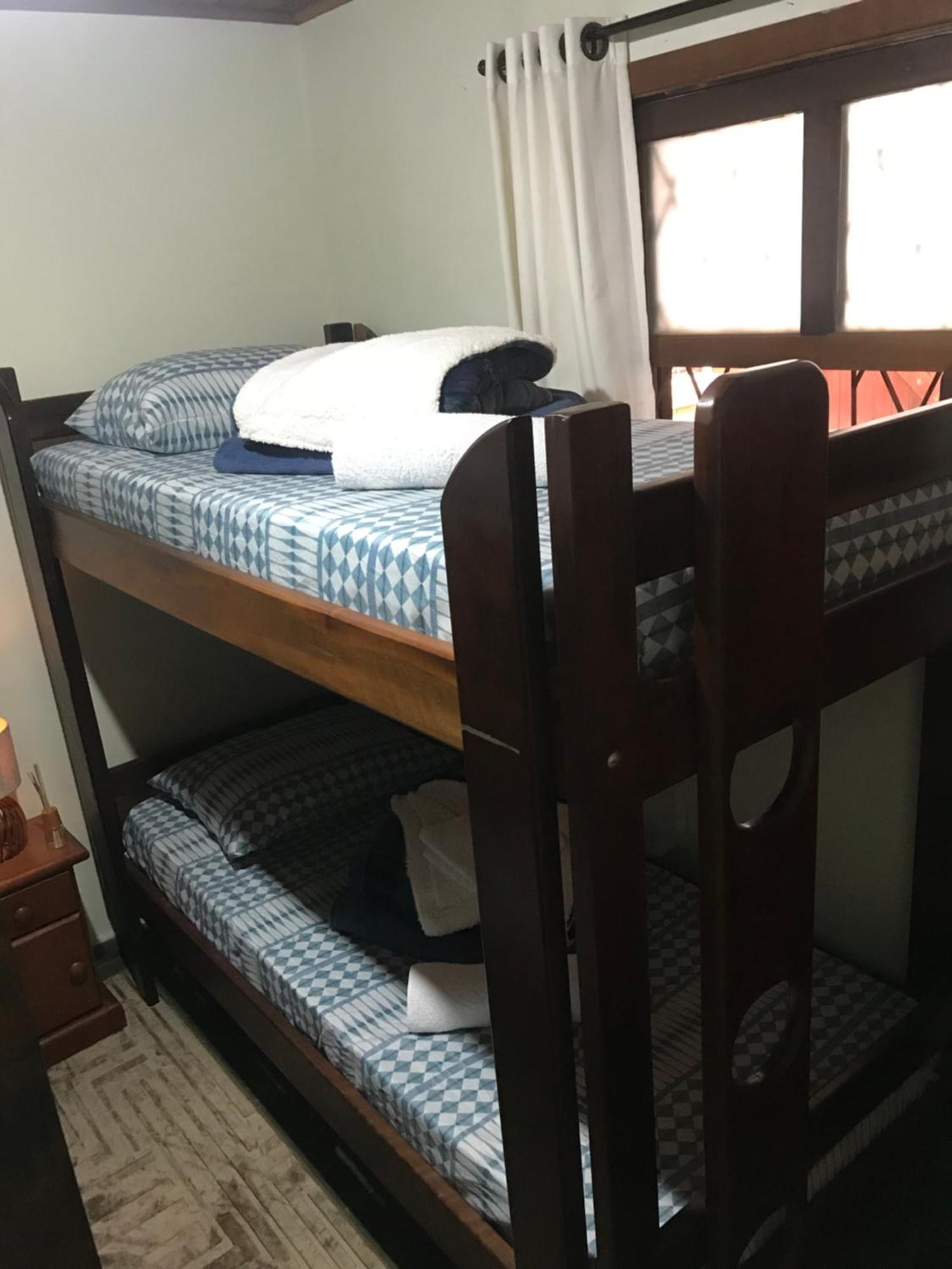 Quarto em Acomodações Particulares Aconchego Serpa Campos do Jordão